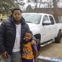 Stranger gifts new basketball hoop to boy who used trash can for practice