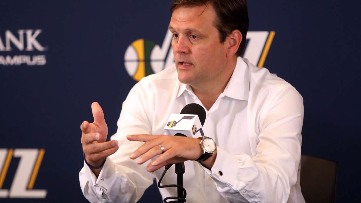 Utah Jazz general manager Dennis Lindsey speaks during a press conference about Danté Exum, Derrick Favors and Raul Neto re-signing with the Utah Jazz at the Zions Bank Basketball Center in Salt Lake City on Friday, July 6, 2018.