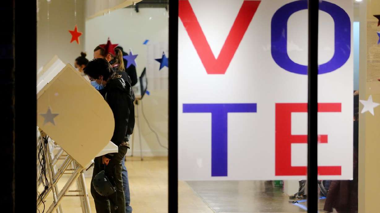 Voters cast their ballots at Trolley Square in Salt
Lake City on Tuesday, Nov. 3, 2020.