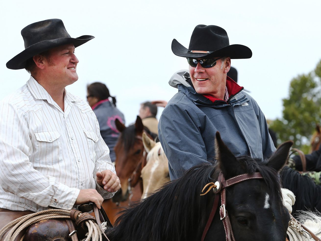 Rancher Kenny Black talks with U.S. Interior Secretary
Ryan Zinke while on a horseback ride in the Bears Ears National
Monument with local and state representatives on Tuesday, May 9,
2017. The Utah Supreme Court ruled Thursday that an environmental
group can continue its lawsuit over violation of public meeting
laws involving meetings between Zinke and government officials from
three Utah counties.