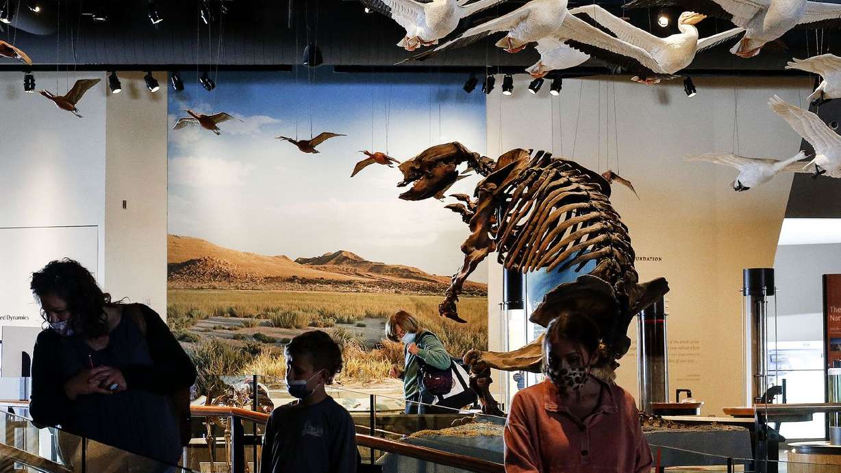 People tour the Natural History Museum of Utah in Salt
Lake City on Friday, Feb. 19, 2021.