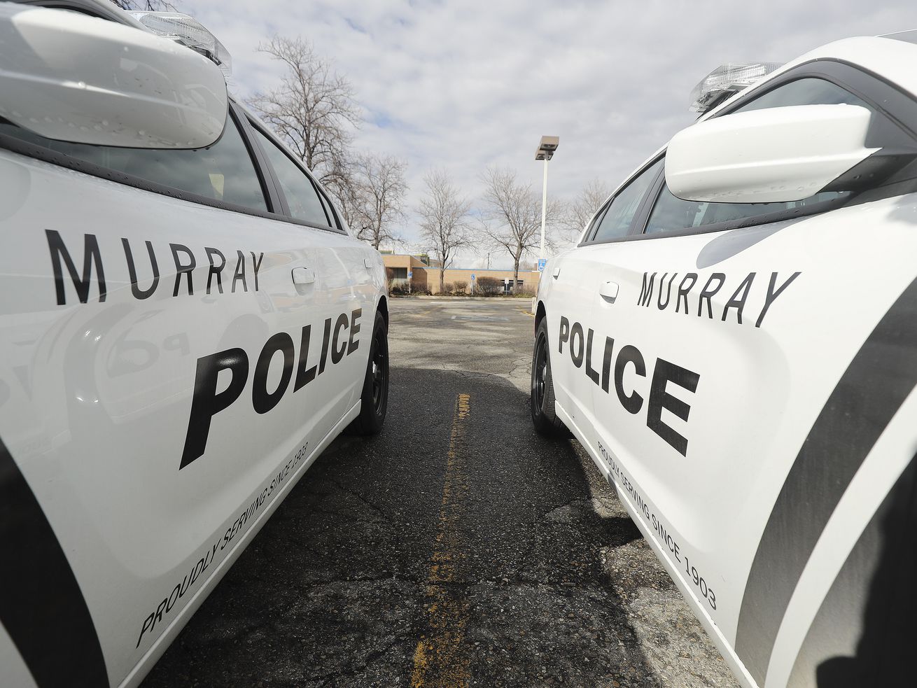 Murray police cruisers are pictured on March 8, 2020. A
man suspected in a double killing in California also faces assault
and gun charges from an earlier incident in Murray, Utah.