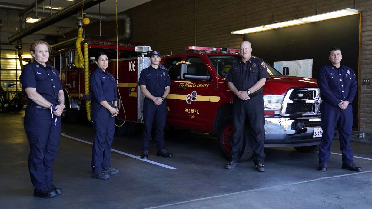 LA firefighters rely on ax, luck to free Woods from crash