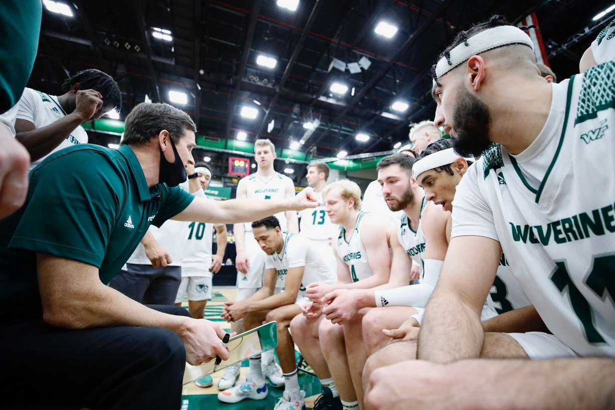 UVU head coach Mark Madsen on the bench with Utah Valley men's basketball during a game against UTRGV, Friday, Feb. 26, 2021 in Orem.