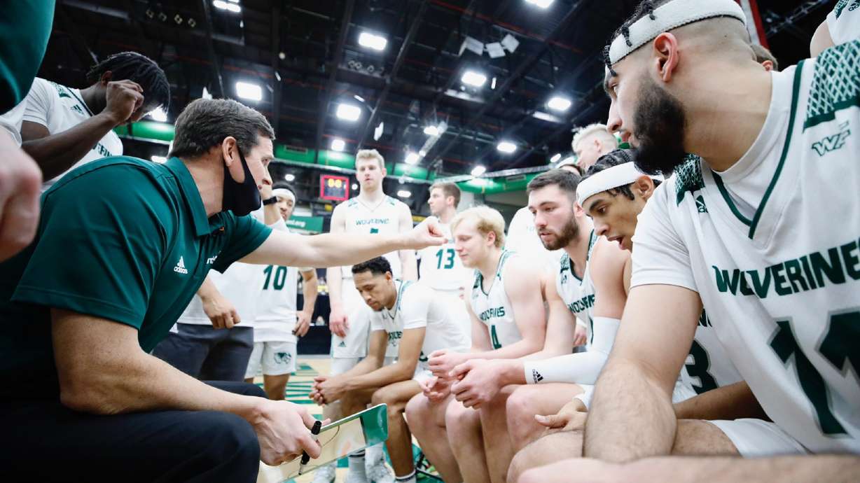Mark Madsen on the bench with Utah Valley men's basketball during a game against UTRGV, Friday, Feb. 26, 2021 in Orem. Madsen agreed to a four-year extension with UVU through 2026, the school announced Monday.