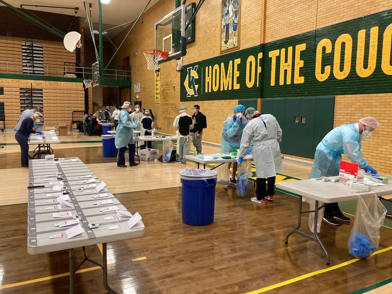 Health care workers conduct rapid COVID-19 tests at Kearns High School on Monday, Feb. 22, 2021, as part of a state "Test to Stay” pilot. Just 11 students tested positive among 1,080
tests conducted.