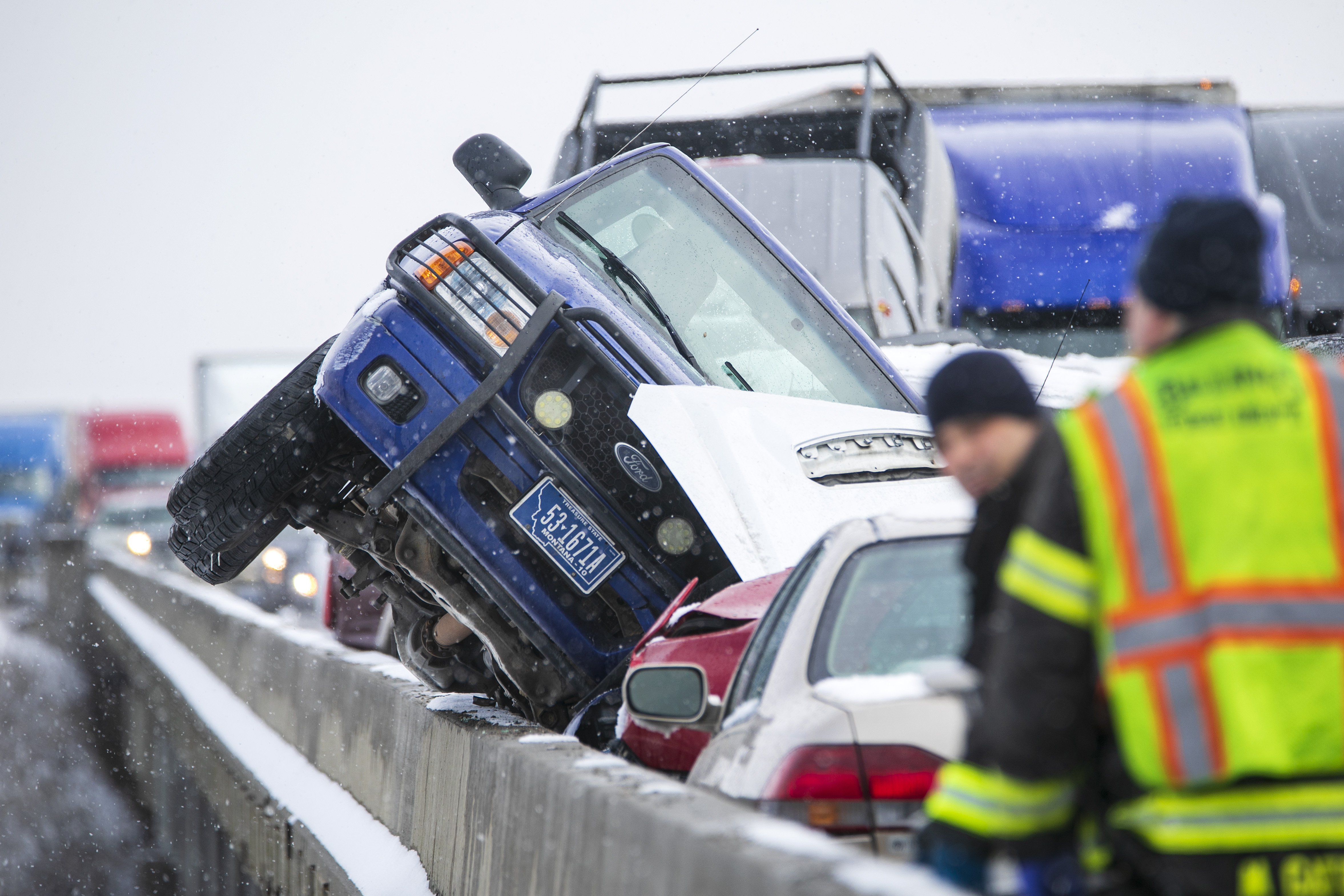 About 30 vehicles involved in pileup on icy Montana bridge