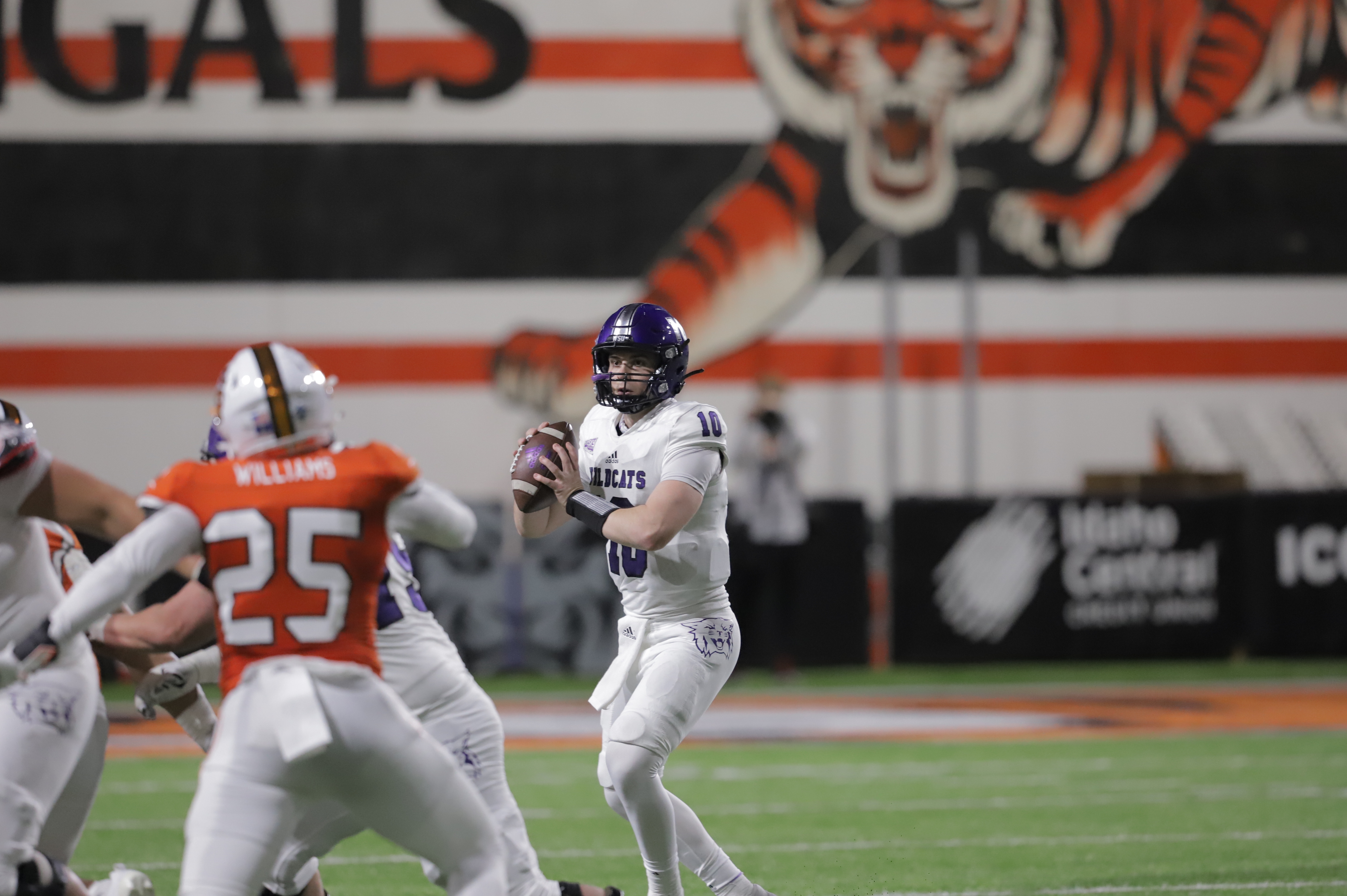 Weber State quarterback Bronson Barron looks to pass during the Wildcats' FCS spring opener at Idaho State, Saturday, Feb. 26, 2021.