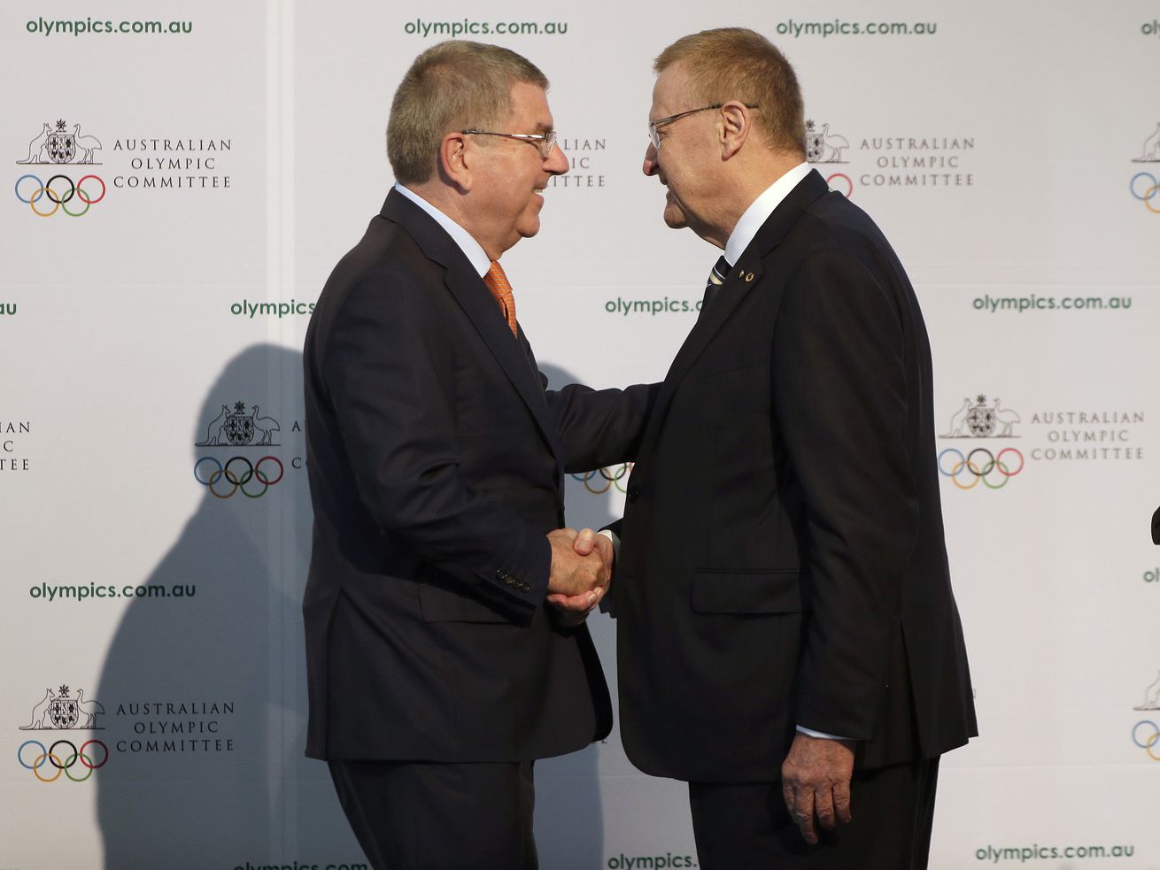 International Olympic Committee President Thomas Bach,
left, shakes hands with Australian Olympic Committee President John
Coates at the AOC annual general meeting in Sydney on May 4, 2019.
The IOC named Brisbane, Australia, its preferred bid for the 2032
Summer Games on Wednesday.