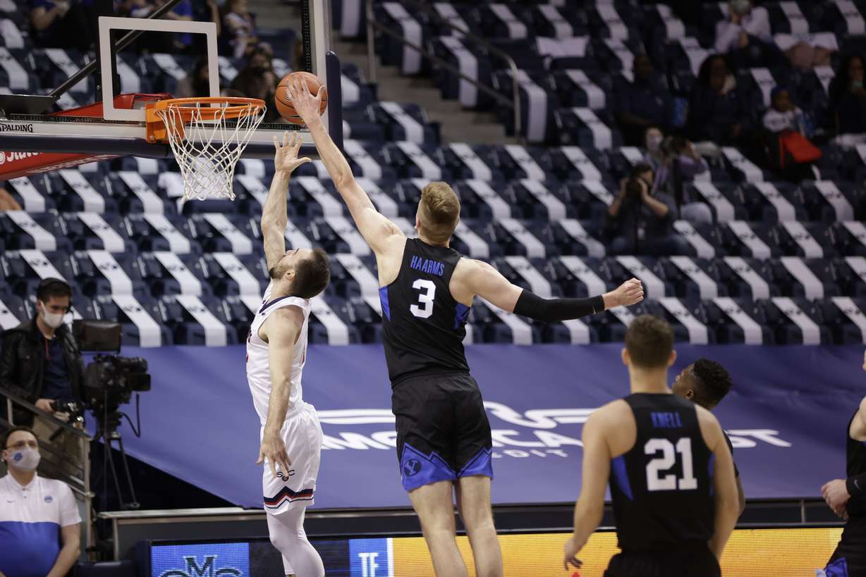 Matt Haarms blocks a shot during BYU's game against Saint Mary's, Saturday, Feb. 27, 2021 in Provo.