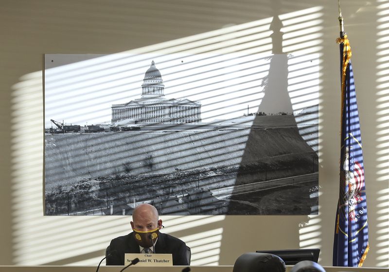 Sen. Daniel Thatcher, R-West Valley City and chairman
of the Senate Government Operations and Political Subdivisions
Standing Committee, listens as Sen. Jerry Stevenson, R-Layton,
sponsor of SB243, discusses the bill during a hearing in the Senate
Building at the Capitol complex in Salt Lake City on Monday, March
1, 2021. The bill would create an inland port fund with a reported
$75 million appropriation.