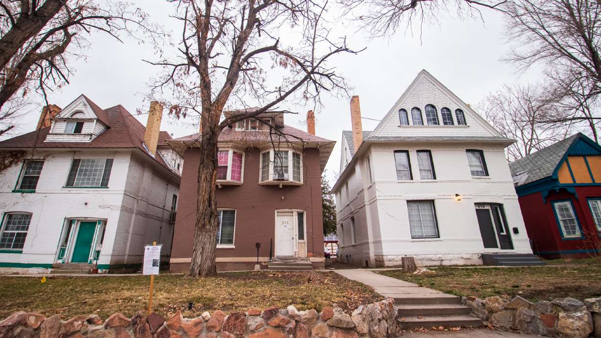 A photo of the four homes on 200 South near Lincoln Street in Salt Lake City considered for demolition on Friday, Feb. 26, 2021. The four homes were constructed in the 1890s, according to historians.