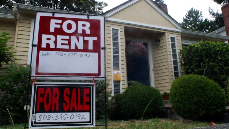 FILE - In this Sept. 13, 2011, file photo, a house is for rent an for sale in Portland, Ore. Experts say owning rental housing can pay off even as market recovers.
