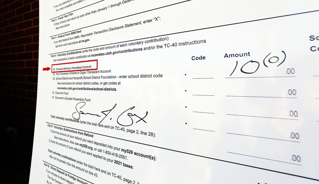 Gov. Spencer Cox's signature is pictured on a tax donation form at the Road Home Midvale Family Resource Center in Midvale on Tuesday, March 2, 2021.