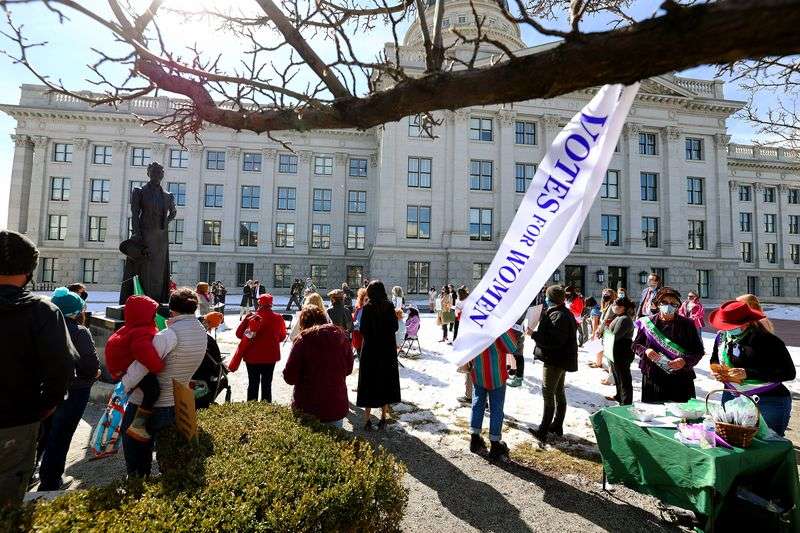 Supporters of the Equal Rights Amendment gather for a rally at the Capitol in Salt Lake City on Tuesday, March 2, 2021.