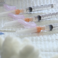 Doctors don't project return of large gatherings until fall at earliest