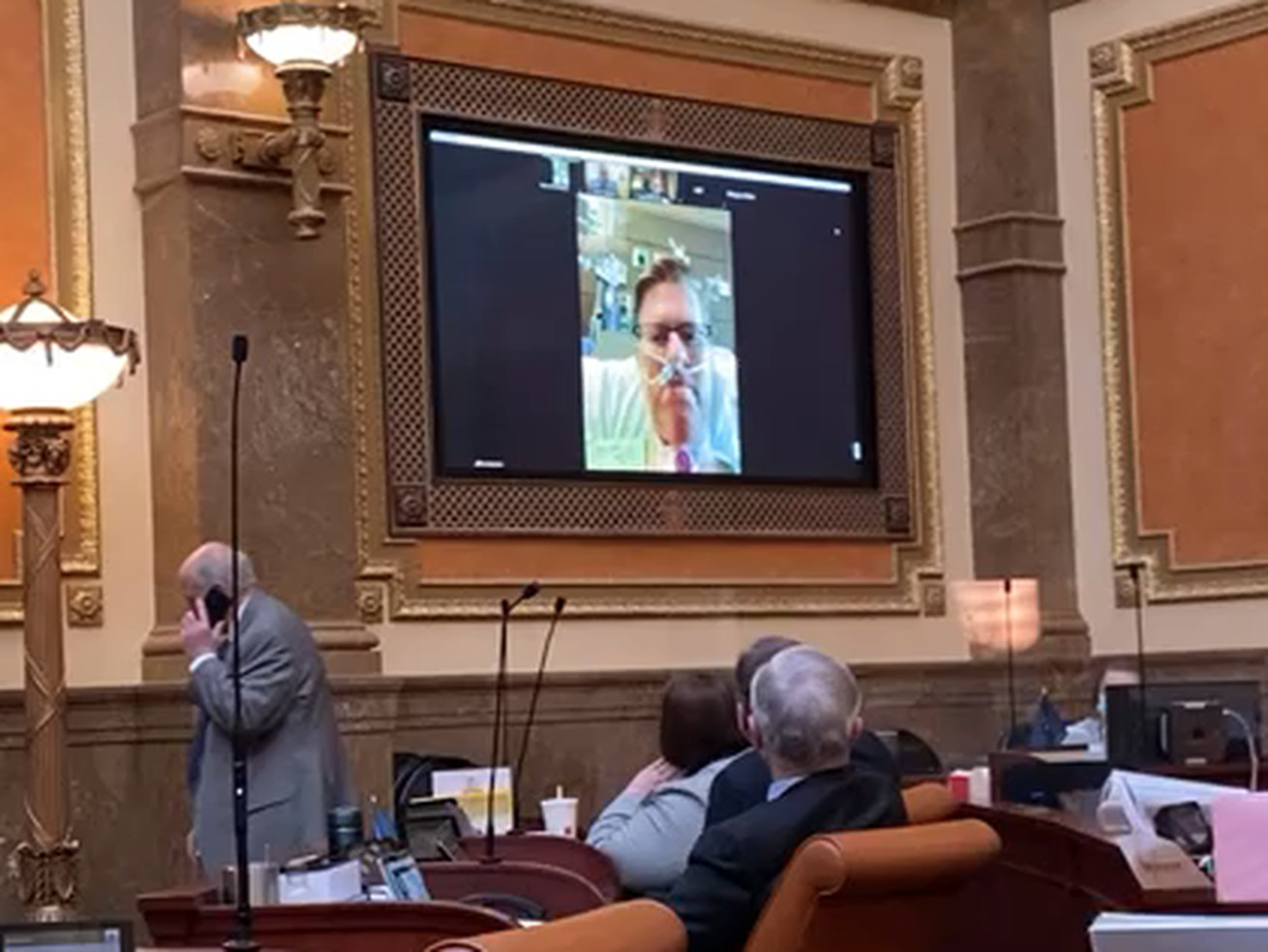 Rep. Jon Hawkins, R-Pleasant Grove, speaks to members
of the House on Thursday, March 4, 2021, from his intensive care
unit hospital bed via a Zoom call. Hawkins has been battling
COVID-19.