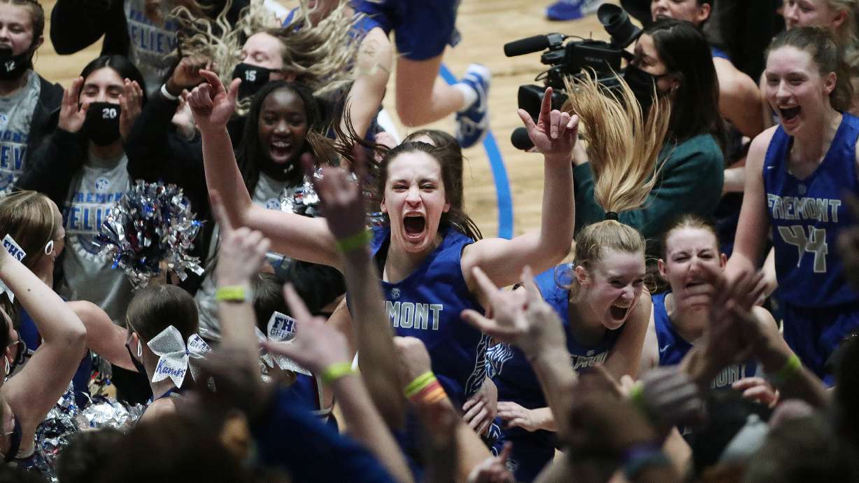 Fremont's Emma Calvert (25) celebrates with teammates their win over Herriman during the 6A girls basketball championship game at Salt Lake Community College in Taylorsville on Saturday, March 6, 2021. Fremont won 63-43.