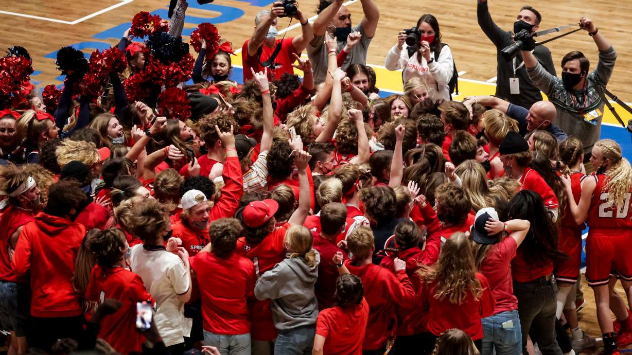 Springville celebrates after beating Farmington in the 5A girls basketball championship at Salt Lake Community College in Taylorsville on Saturday, March 6, 2021.