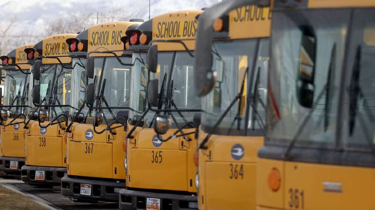 School buses are parked outside of the Salt Lake City
School District’s Pupil Transportation building in Salt Lake City
on Thursday, Feb. 11, 2021.