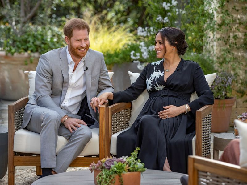 Prince Harry and Meghan, The Duke and Duchess of Sussex, give an interview to Oprah Winfrey in this undated handout photo.