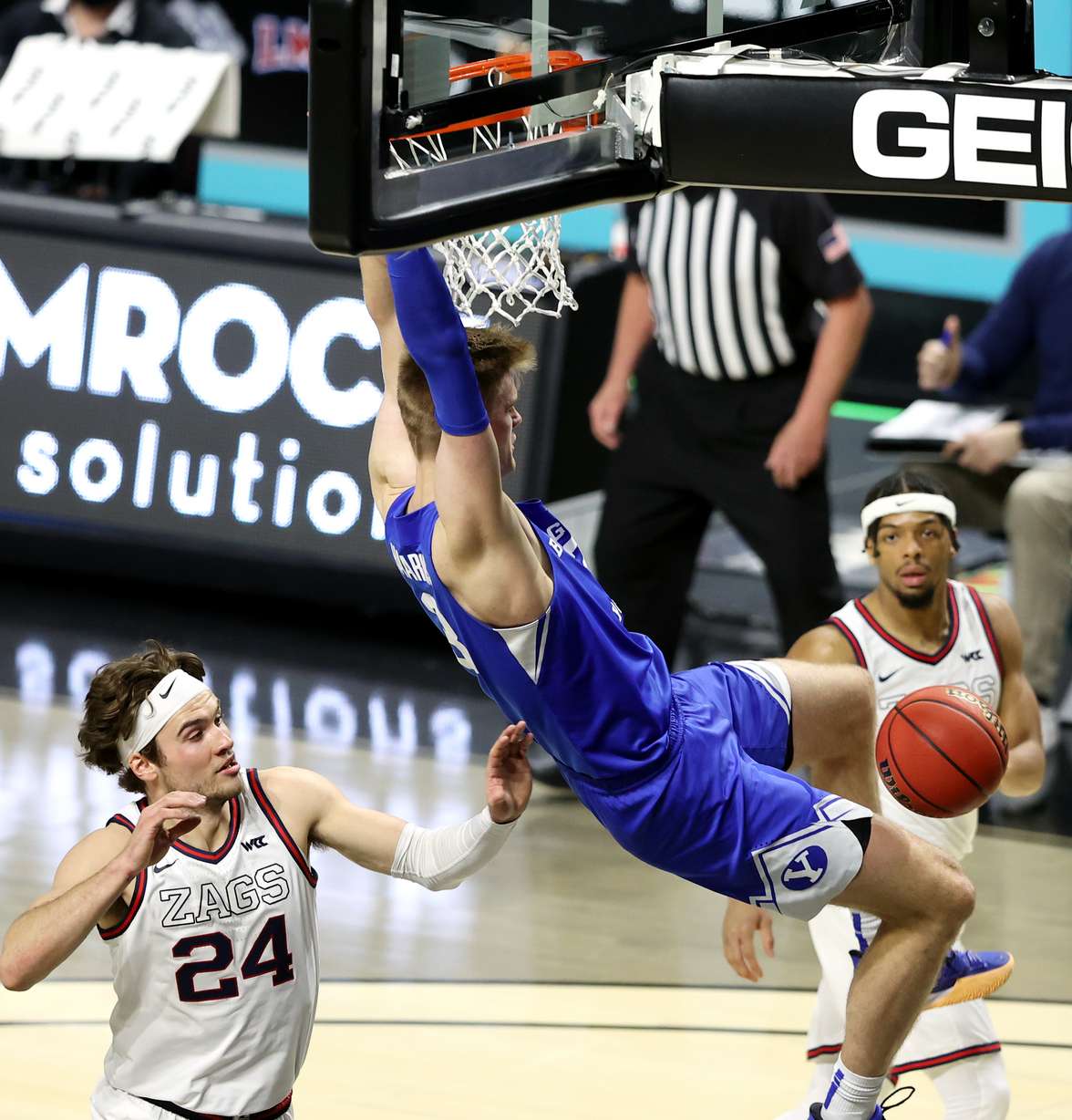 BYU forward Matt Haarms (3) dunks over Gonzaga forward Corey Kispert (24) as BYU and Gonzaga play in the finals of the West Coast Conference tournament at the Orleans Arena in Las Vegas on Tuesday, March 9, 2021.