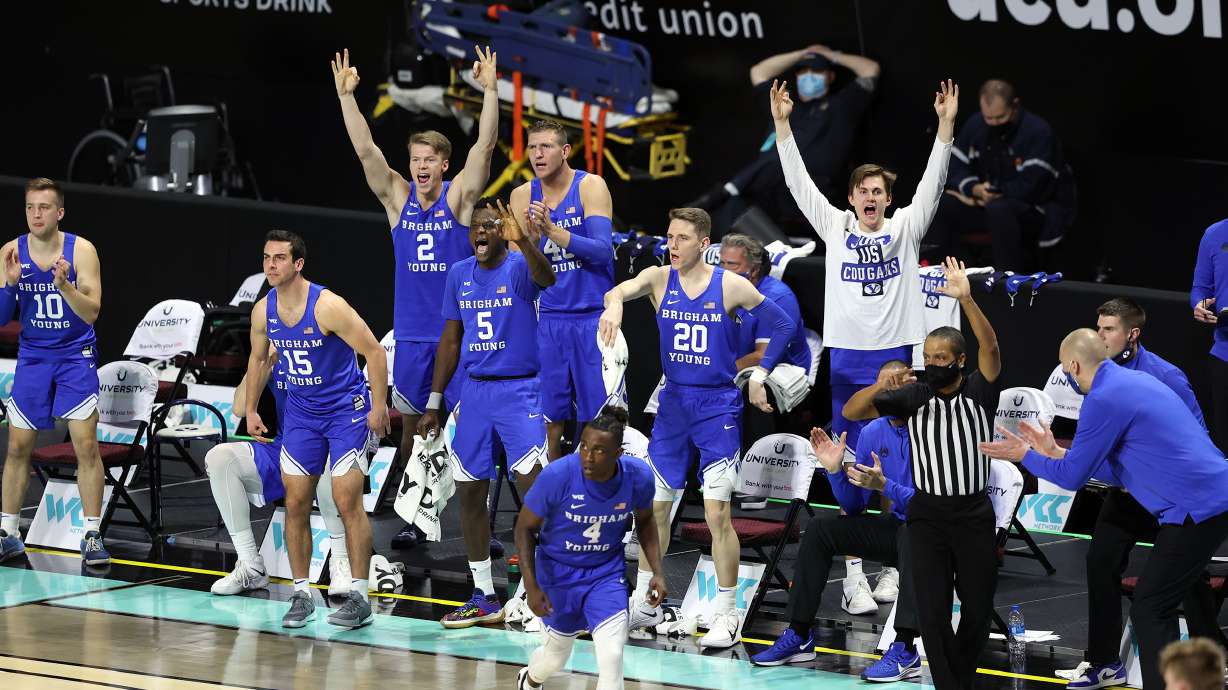 BYU cheers a 3-point shot as BYU and Gonzaga play in the finals of the West Coast Conference tournament at the Orleans Arena in Las Vegas on Tuesday, March 9, 2021. Gonzaga won 88-78.
