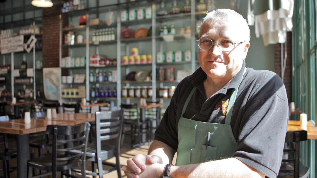 Tony Caputo poses for a portrait at his deli in downtown Salt Lake City Wednesday, May 10, 2006. The recently-published book "American Sandwich" picks one sandwich from each state to profile, and named The Caputo to represent Utah. Photo by Jason Olson