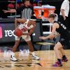 Utes survive Huskies' late-game surge to advance to Pac-12 quarterfinals with 98-95 win