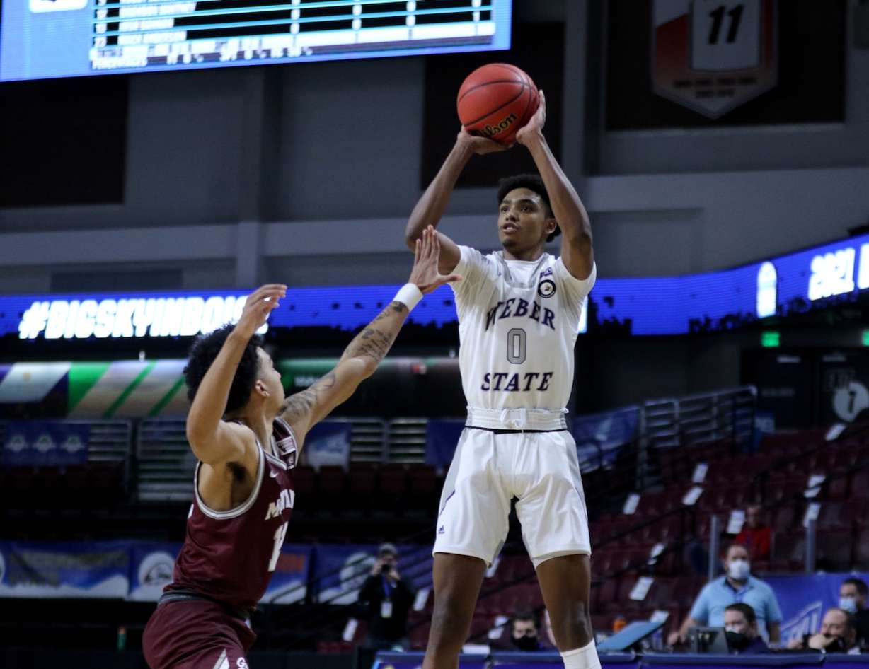Zahir Porter shoots over Montana during Weber State's quarterfinal game at the Big Sky Tournament, Thursday, March 11, 2021 in Boise.