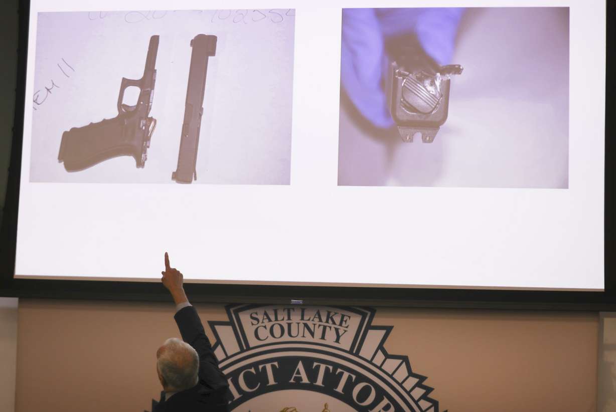 Salt Lake County District Attorney Sim Gill points to slide presentation on the officer-involved shooting of Damien Evans during a press conference at the district attorney's office building in Salt Lake City on Friday, March 12, 2021. A West Valley police officer who shot and killed Evans, an armed parole fugitive, while working with the U.S. Marshals apprehension team on Aug. 27, 2020, was justified in using deadly force, but a second officer was not legally justified when he also fired his weapon during the incident, Gill's office has concluded.