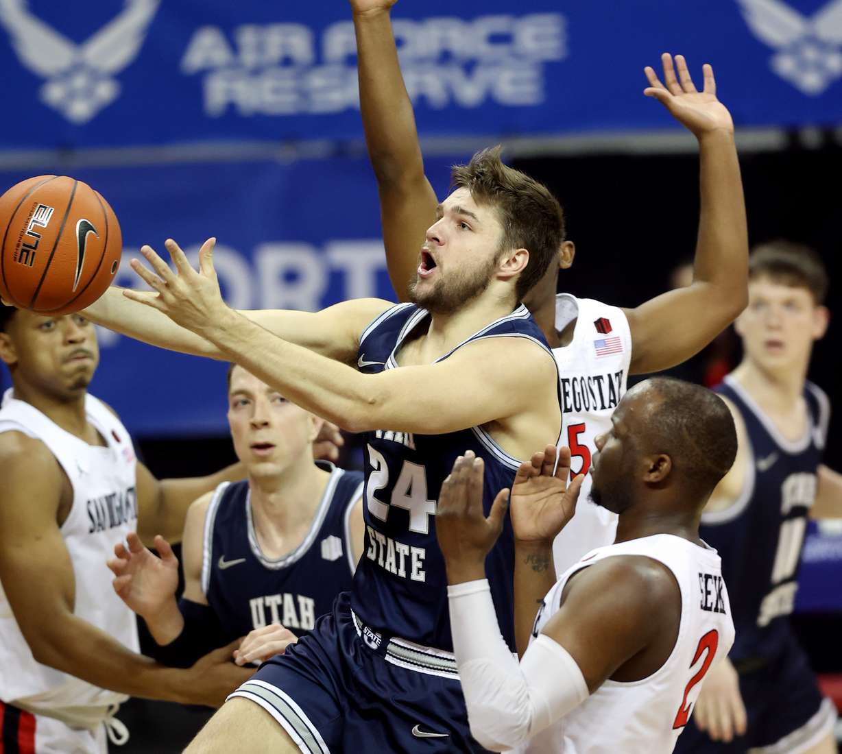 Utah State Aggies guard Rollie Worster (24) drives to the hoop as Utah State and San Diego State play in the championship game of the Mountain West Tournament at the Thomas & Mack Center in Las Vegas on Saturday, March 13, 2021.