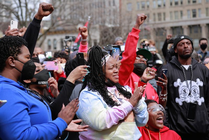 Breonna Taylor's relatives attend a rally to mark one year since police officers shot and killed Breonna when they entered her home, in Louisville, Kentucky, U.S., March 13, 2021.