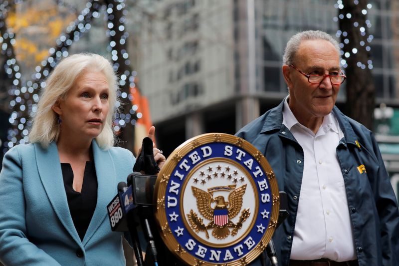 FILE PHOTO: U.S. Senator Chuck Schumer and U.S Senator Kirsten Gillibrand deliver remarks on the coronavirus disease (COVID-19) in Manhattan, New York City, U.S., November 15, 2020.  REUTERS/Andrew Kelly