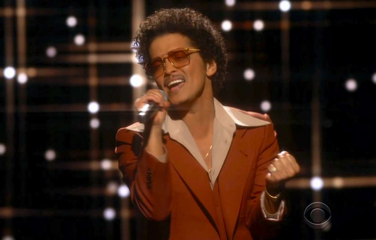 In this video grab provided by CBS and the Recording Academy, Bruno Mars performs "Leave The Door Open"at the 63rd annual Grammy Awards at the Los Angeles Convention Center on Sunday, March 14, 2021.