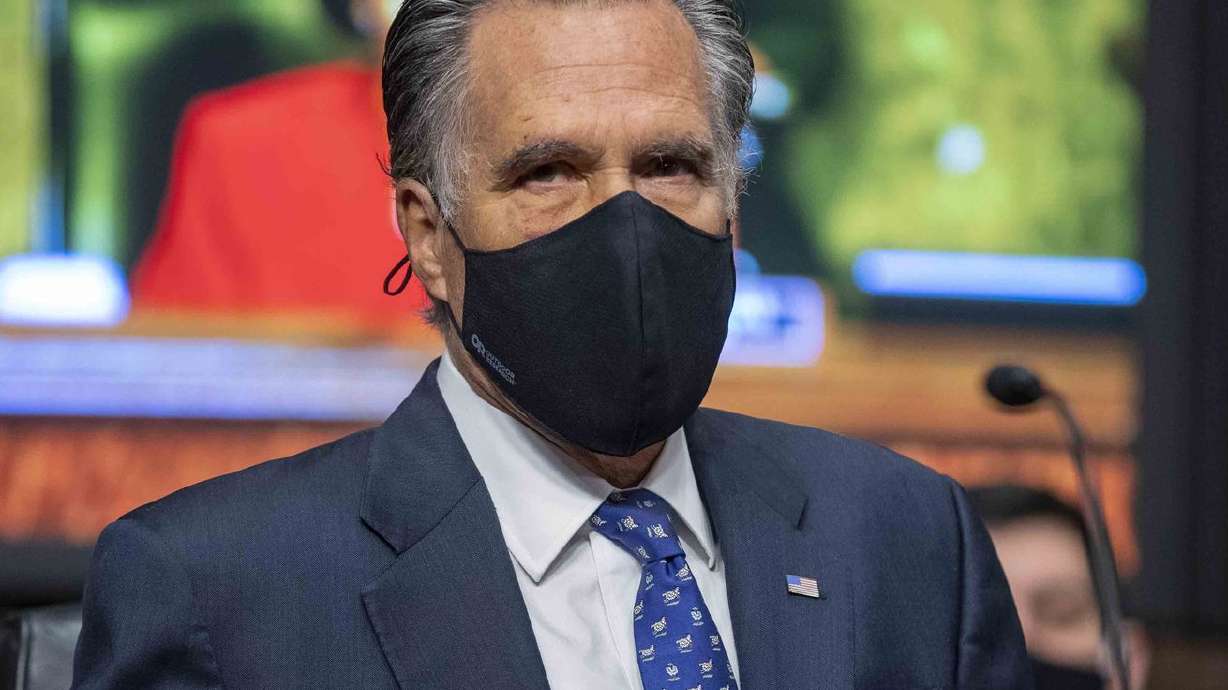 Sen. Mitt Romney, R-Utah, takes his seat Wednesday,
March 3, 2021, prior to a Senate Committee on Homeland Security and
Governmental Affairs and Senate Committee on Rules and
Administration joint hearing examining the Jan. 6, attack on the
U.S. Capitol in Washington.