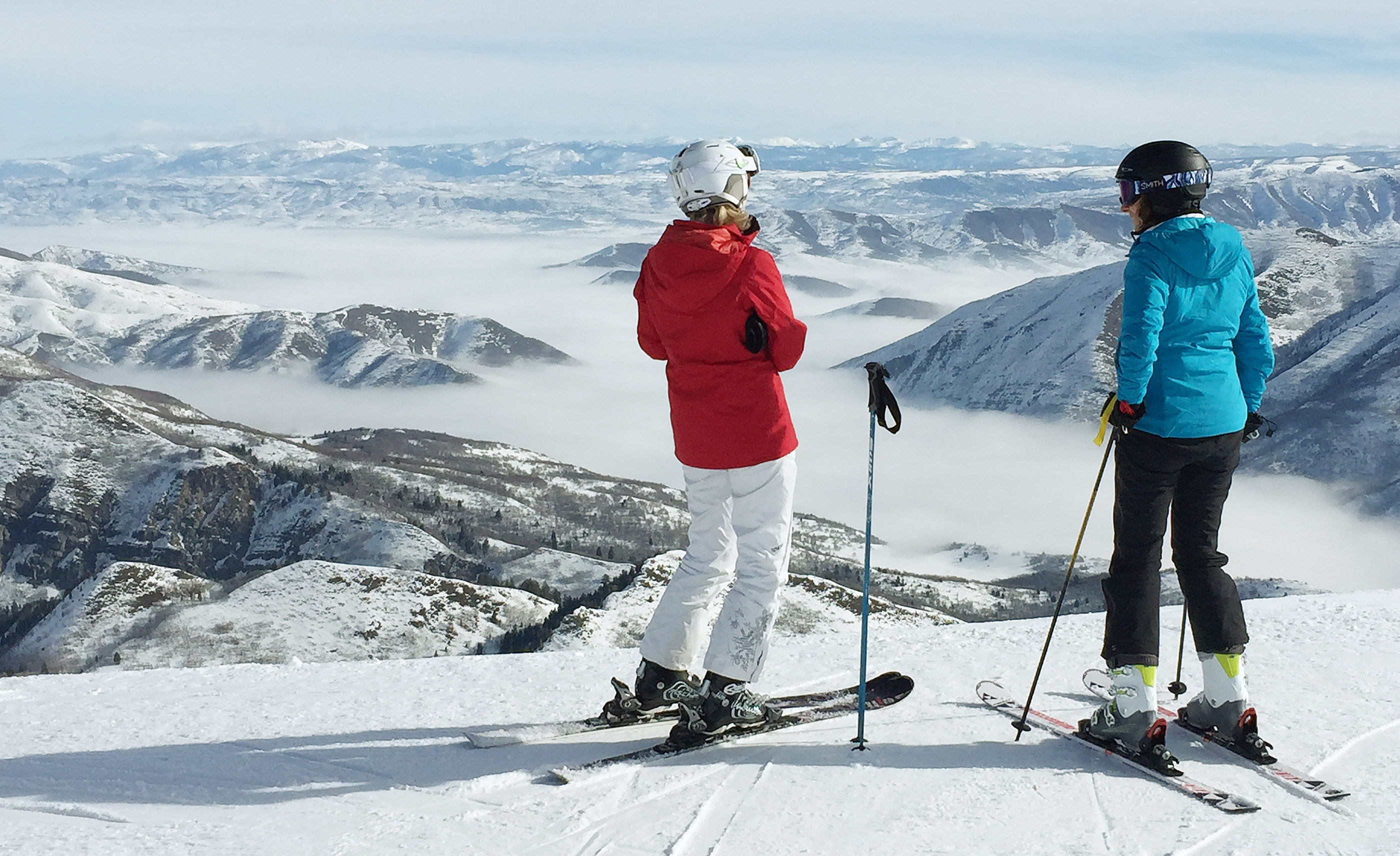 Sundance Mountain Resort skiers look at the inversion over Provo Canyon and the Heber Valley on Tuesday, Feb. 16, 2016.