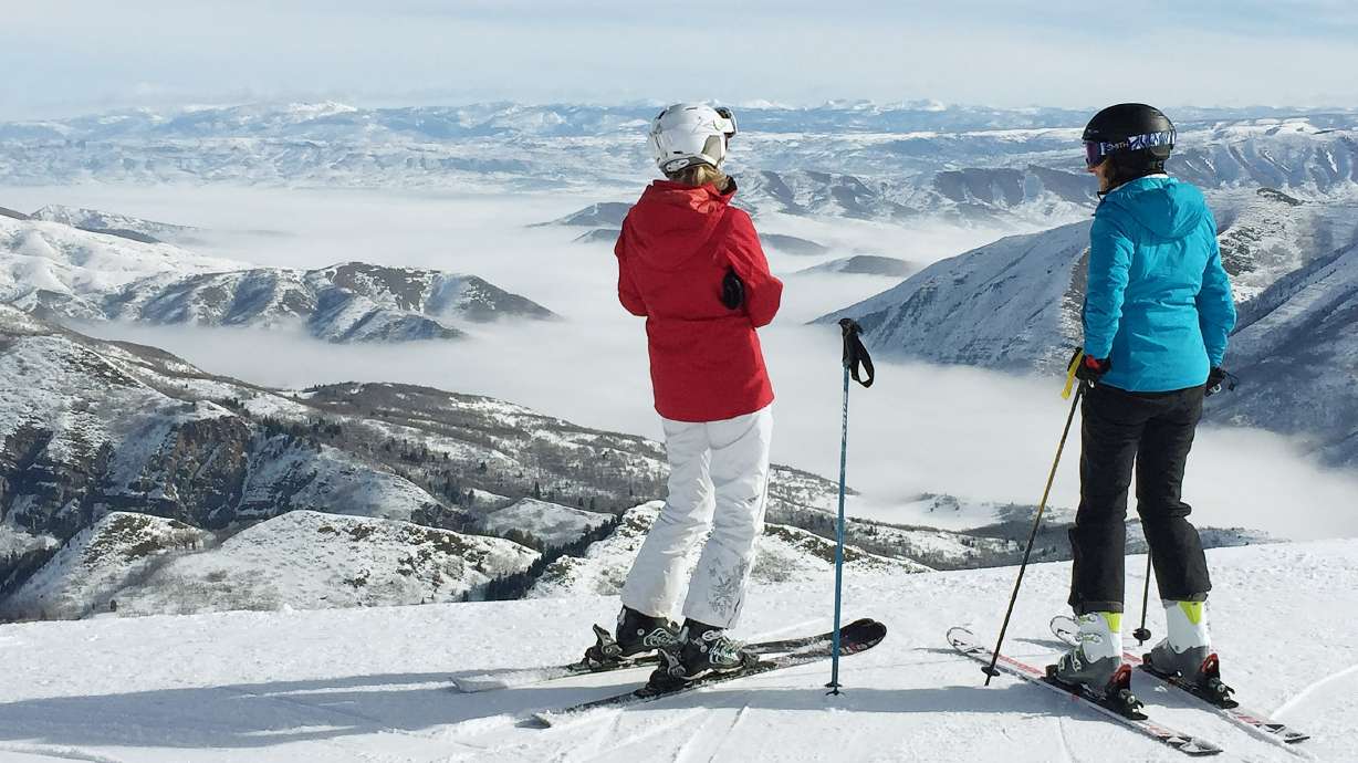 Sundance Mountain Resort skiers look at the inversion over Provo Canyon and the Heber Valley on Tuesday, Feb. 16, 2016.