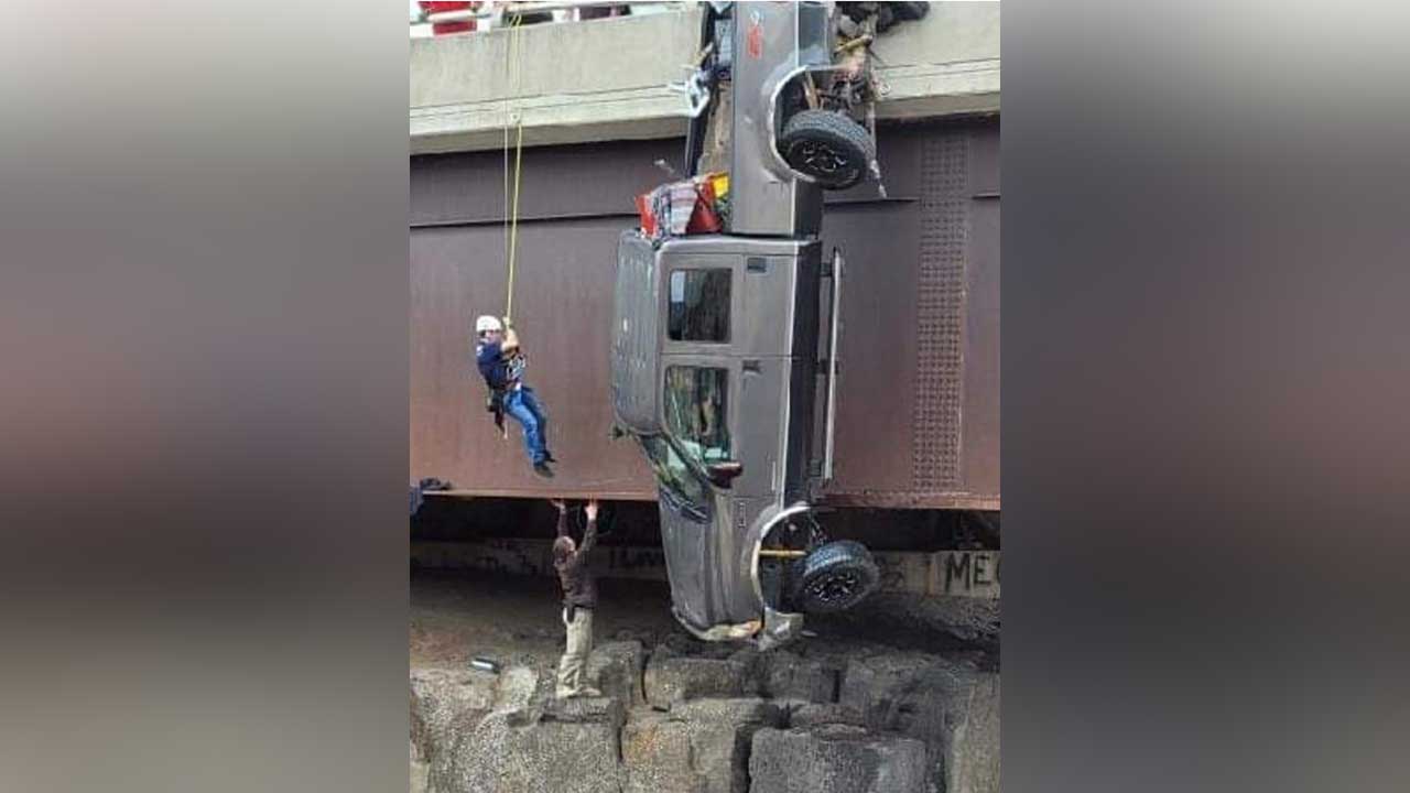 Crews rescue Idaho couple, dogs from pickup hanging over gorge