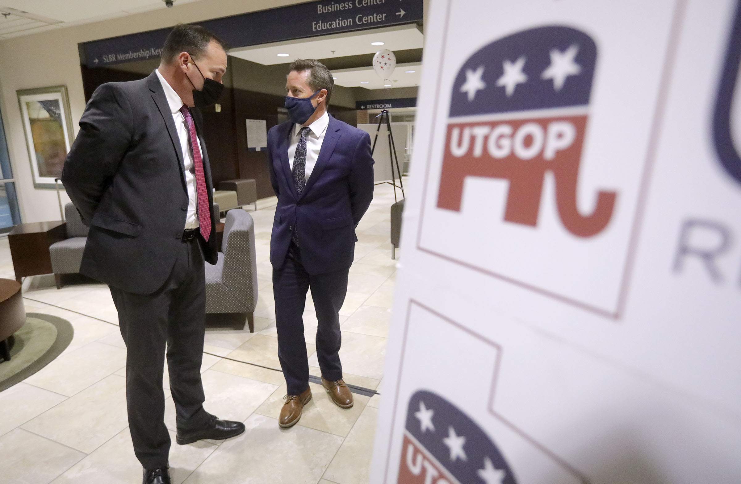 Sen. Mike Lee, R-Utah, left, talks to Derek Brown, Utah Republican Party chairman, at a Republican election night event at the Utah Association of Realtors building in Sandy on Tuesday, Nov. 3, 2020.