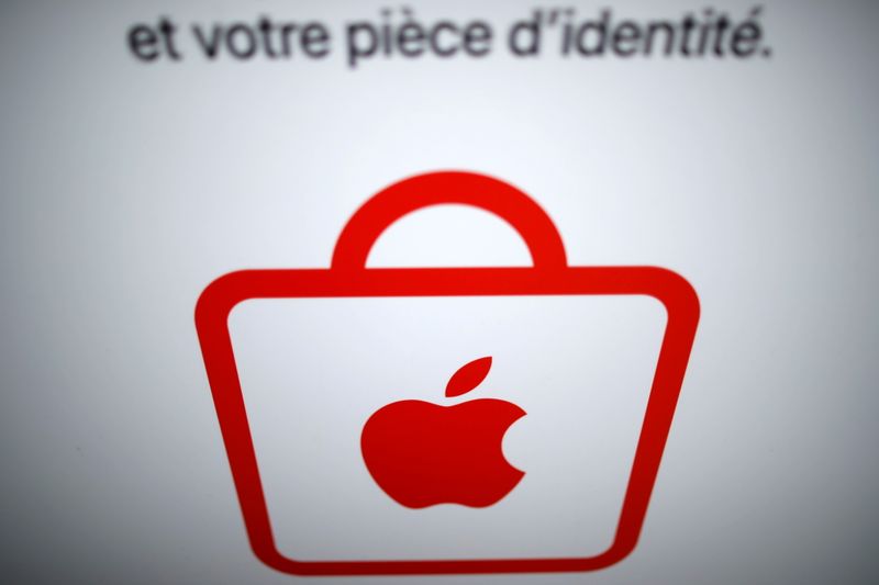 Apple logo is seen on an Apple store in Paris, France, March 17, 2021. REUTERS/Gonzalo Fuentes