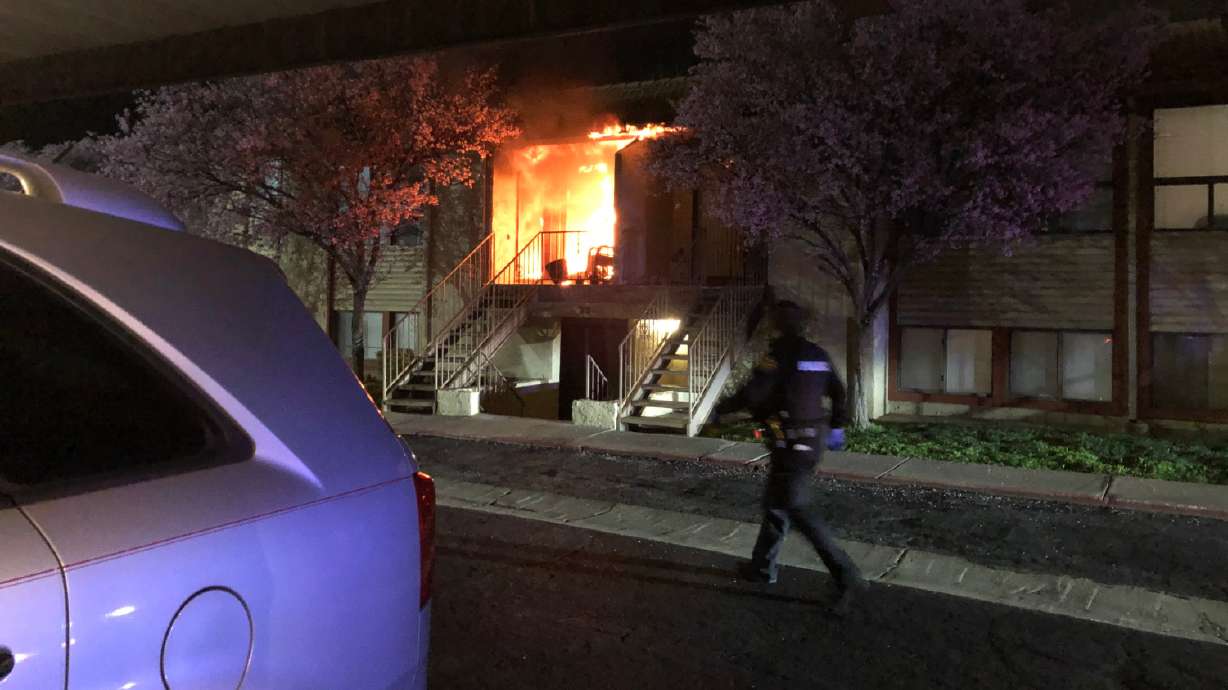 St. George Police officers are first at the scene of a structure fire reported at an apartment complex near the corner of 500 South and Bluff Street, St. George, Utah, March 16, 2021