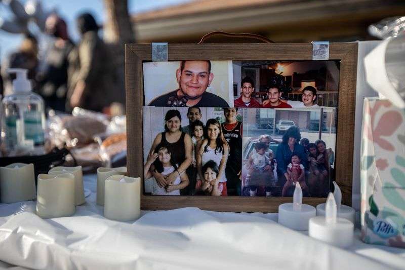 Photos of Alonso Garcia are pictured at vigil for him
outside of a Latter-Day Saints meetinghouse at 5305 W. 5400 South in Kearns on Sunday, March 14, 2021. Garcia was shot and killed in the parking lot.