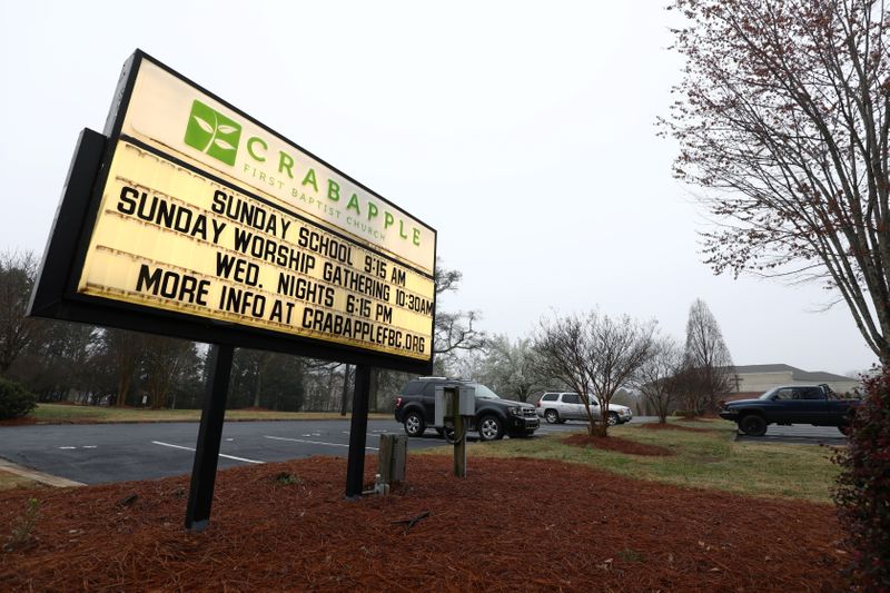 General view of Crabapple First Baptist Church's signage board, following the deadly shootings at three day spas, in Alpharetta, near Atlanta, Georgia, U.S., March 17, 2021. REUTERS/Dustin Chambers