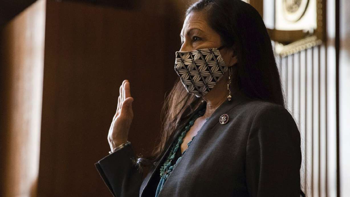 Rep. Deb Haaland, D-N.M., is sworn in during a Senate
Committee on Energy and Natural Resources hearing on her nomination
to be interior secretary on Capitol Hill in Washington on Feb. 23,
2021. The newly confirmed secretary plans to visit two
controversial national monuments in Utah and meet with state, local
and tribal leaders in one of her first orders of business.