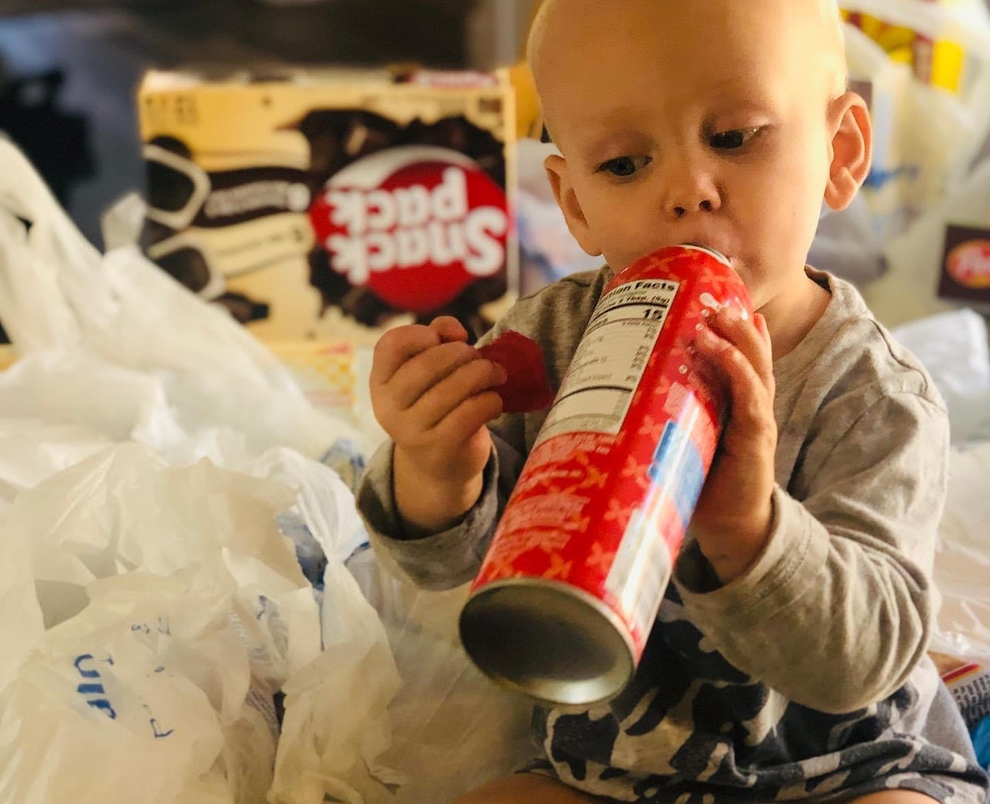 Arianne Brown's youngest son helps himself to canned whipped cream.