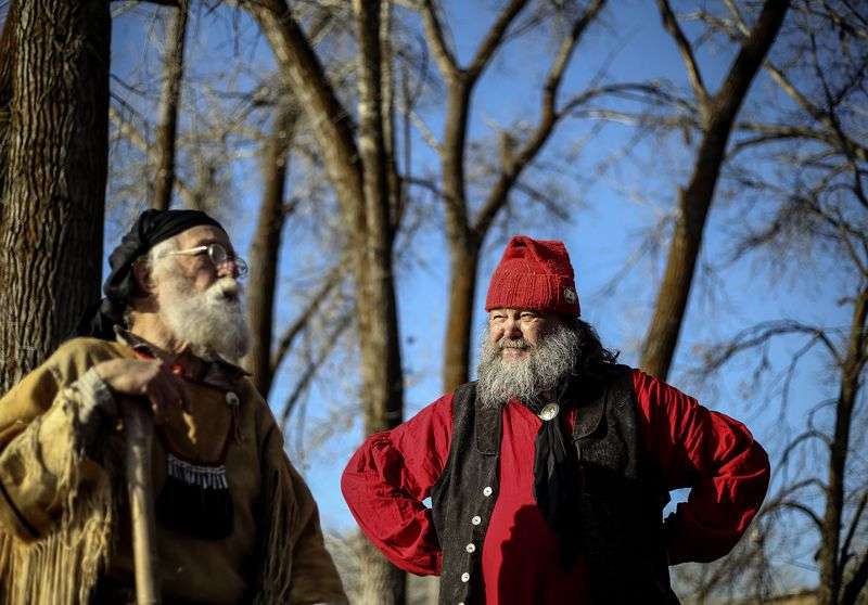 Larry Price and Mark Balliet plan their upcoming float
trip at Fort Buenaventura in Ogden on Wednesday, March 17, 2021.
The men are planning to float down the Bear River from Cutler Dam
to as close they can get to the Great Salt Lake in late May to
commemorate Jim Bridger’s 1825 trip.