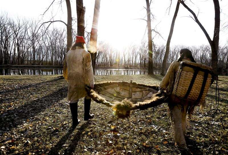 Mark Balliet and Larry Price carry their bull boat to
the pond at Fort Buenaventura in Ogden for a float test on
Wednesday, March 17, 2021. The men are planning to float down the
Bear River from Cutler Dam to as close they can get to the Great
Salt Lake in late May to commemorate Jim Bridger’s 1825
trip.