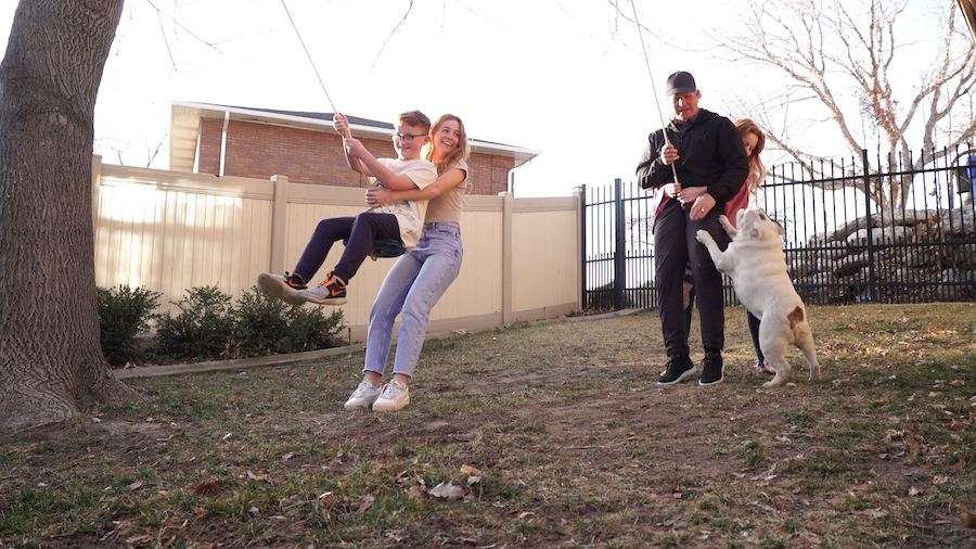 Former TV reporter Casey Scott plays in the backyard with his three kids Preslee, Frankie and Boden Scott.