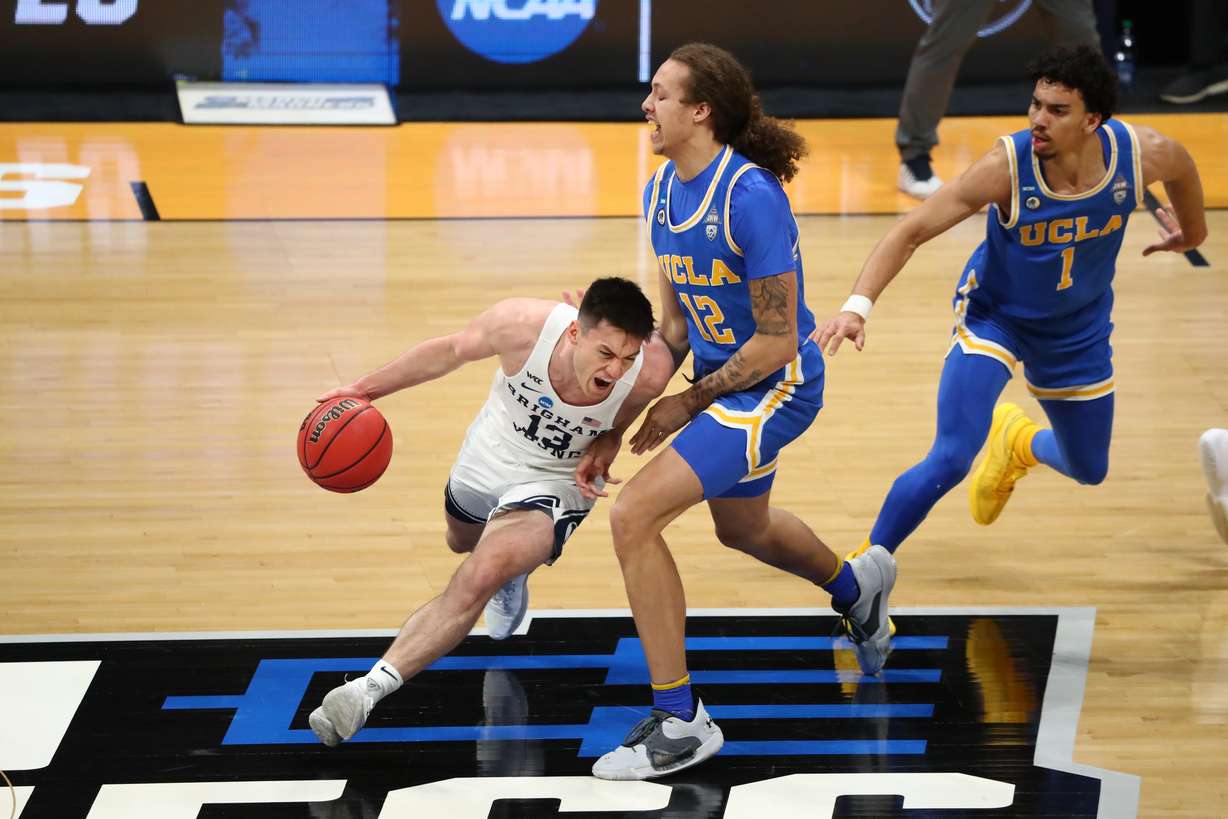 BYU guard Alex Barcello drives in the first round of the 2021 NCAA Division I Men’s Basketball Tournament held at Hinkle Fieldhouse on March 20, 2021 in Indianapolis, Indiana.